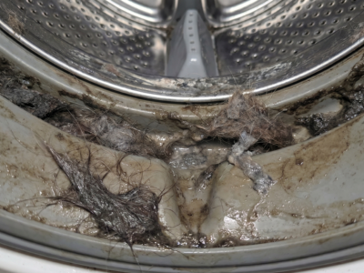 Washing machine with pet fur buildup